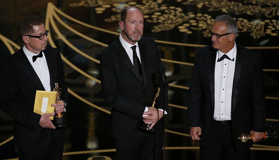 Winners for Sound Mixing, Chris Jenkins (C), Gregg Rudloff (L) and Ben Osmo (R) accept the Oscar for their work on "Mad Max: Fury Road" at the 88th Academy Awards in Hollywood, California February 28, 2016. REUTERS/Mario Anzuoni