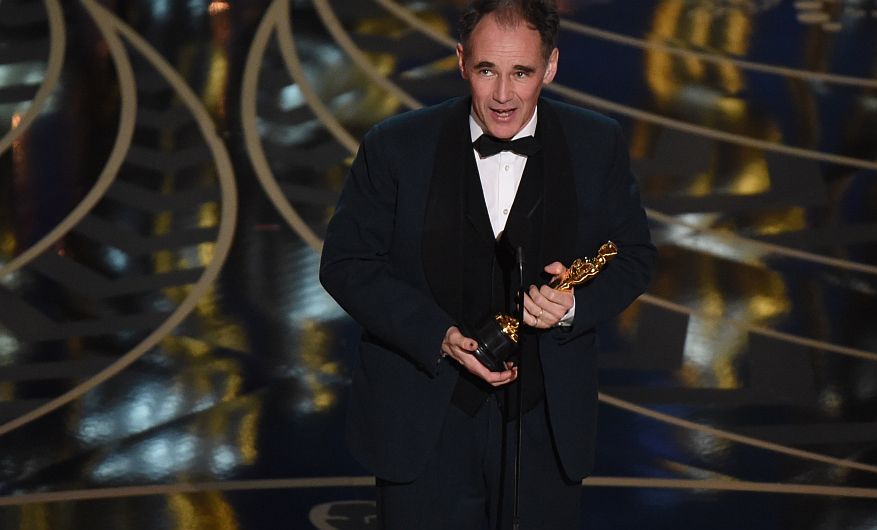 Actor Mark Rylance accepts his award for Best Supporting Actor in Bridge of Spies on stage at the 88th Oscars on February 28, 2016 in Hollywood, California. AFP PHOTO / MARK RALSTON