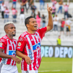Carlos Bacca festejando su primer gol en Junior Dimayor
