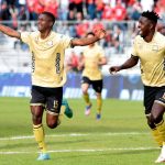 Jugadores de Aguilas Doradas celebran  al derrotar 2-0 al América de Cali en el estadio Alberto Grisales de Rionegro. Foto Dimayor