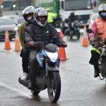 Parrillero en moto