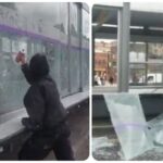 Mujer vandalizando estación de TransMilenio en Bogotá. Foto Capture de video publicado en el Twitter de @luciabastidasu