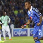 BOGOTA, COLOMBIA  FEBRUARY 09: Roman Torres of Millonarios celebrates a scored goal against Atletico Nacional during a match between Millonarios and Atletico Nacional as part of the  Liga Postobon I 2004  at Nemesio Camacho  El Campin Stadium on February  09 , 2014 in Bogota, Colombia. (Photo by Felipe Caicedo/ LatinContent /Getty Images)