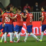 Chile's midfielder Arturo Vidal (C L) celebrates with teammates after scoring against Mexico during their 2015 Copa America football championship match, in Santiago, on June 15, 2015.  AFP PHOTO / RODRIGO ARANGUA