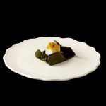 Envuelto de pescado, arroz titoté y caracol