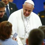 Pope Francis shakes hands with an inmate during a meeting with prisoners at Curran-Fromhold Correctional Facility in Philadelphia