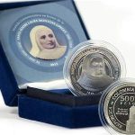 Moneda Hermana Laura