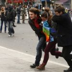 Protestors clash with riot police clash during a rally against global warming on November 29, 2015 in Paris, a day ahead of the start of UN conference on climate change COP21. Paris riot police fired teargas November 29 in clashes with far-left activists in Paris during a climate change demonstration ahead of key UN talks after several thousand protesters had formed a human chain in the city. AFP PHOTO / FLORIAN DAVID / AFP / FLORIAN DAVID