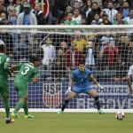 Bolivia's goalkeeper Carlos Lampe (C) eyes the ball during the Copa America Centenario football tournament match against Argentina in Seattle, Washington, United States, on June 14, 2016. / AFP PHOTO / Jason REDMOND