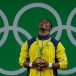 Oscar Figuerosa, oro en levantamiento de pesas.